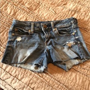 Super stretch distressed jean shorts